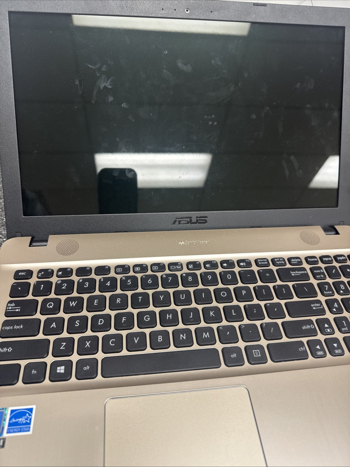 Asus R541N Laptop BATTERY NOT TESTED AND HAS SCRATCHES. HINGE IS GIVING OUT!!!!!