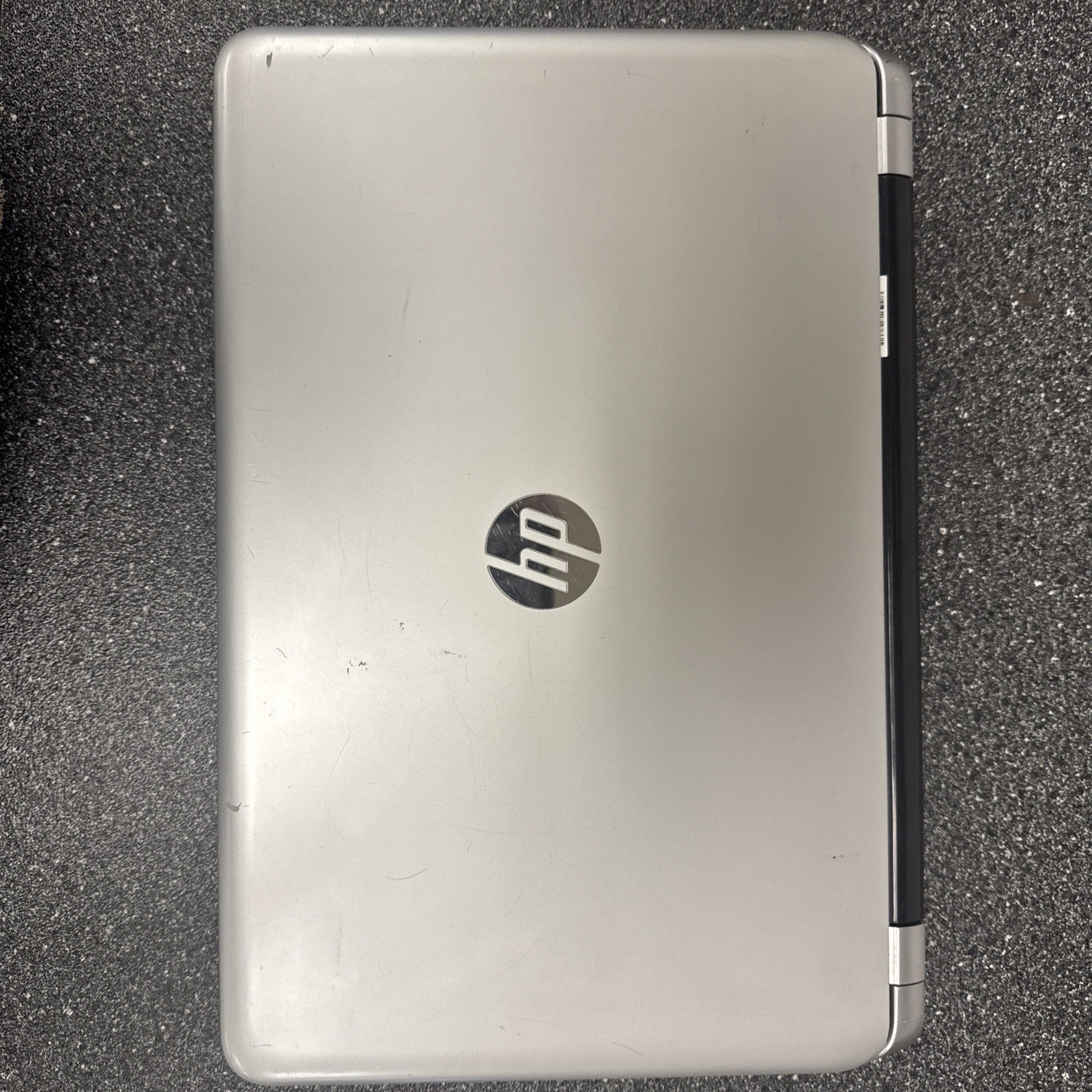 HP Pavilion 15-n067nr BATTERY NOT TESTED AND HAS SCRATCHES AND STAINS ON IT!!!!!